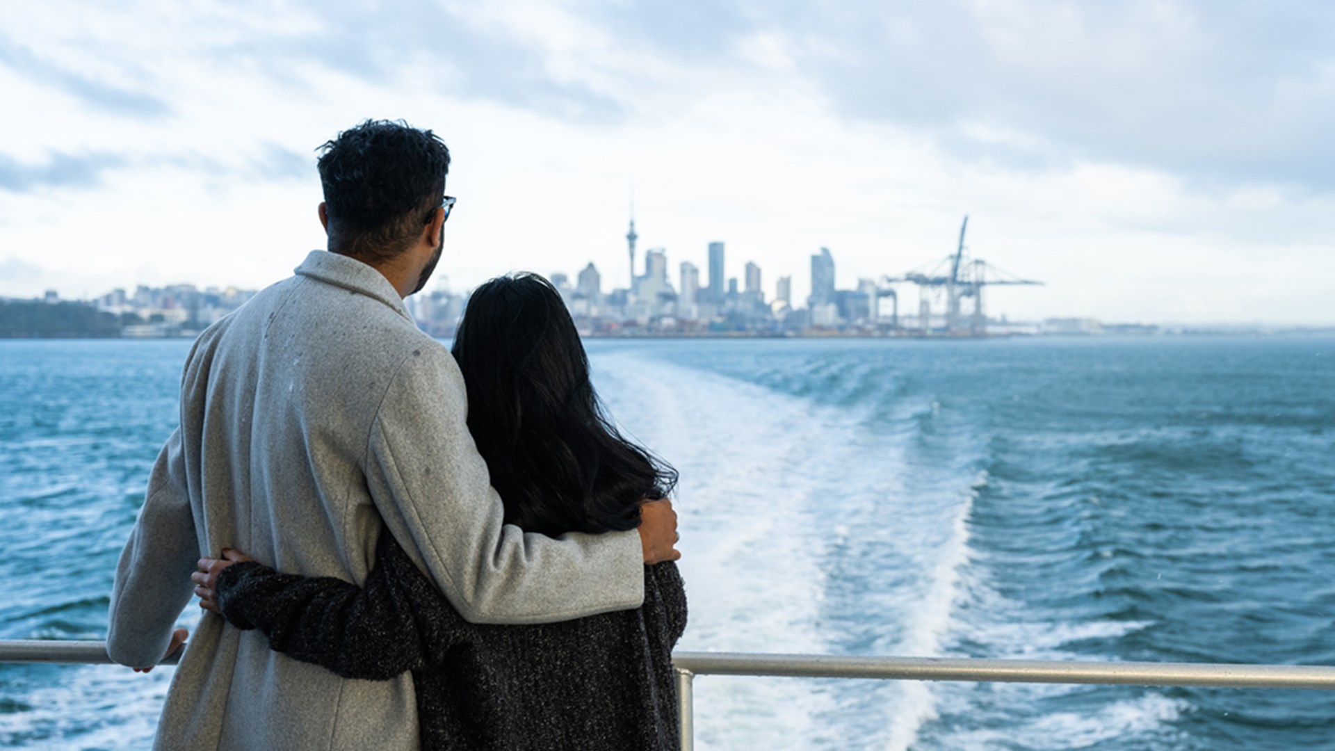 Auckland skyline at dusk seen from return ferry.jpg